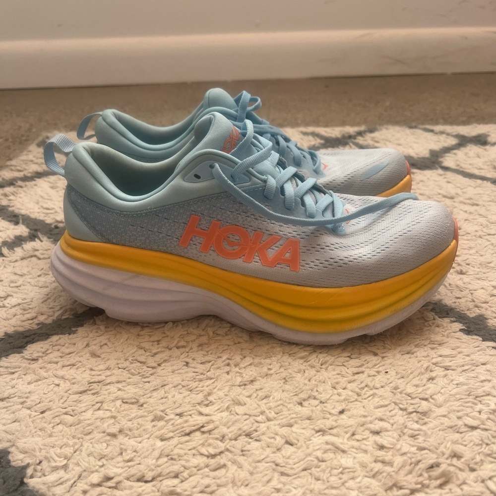 Hoka One One Athletic Shoes Orange and Blue Maximalist Cushioning